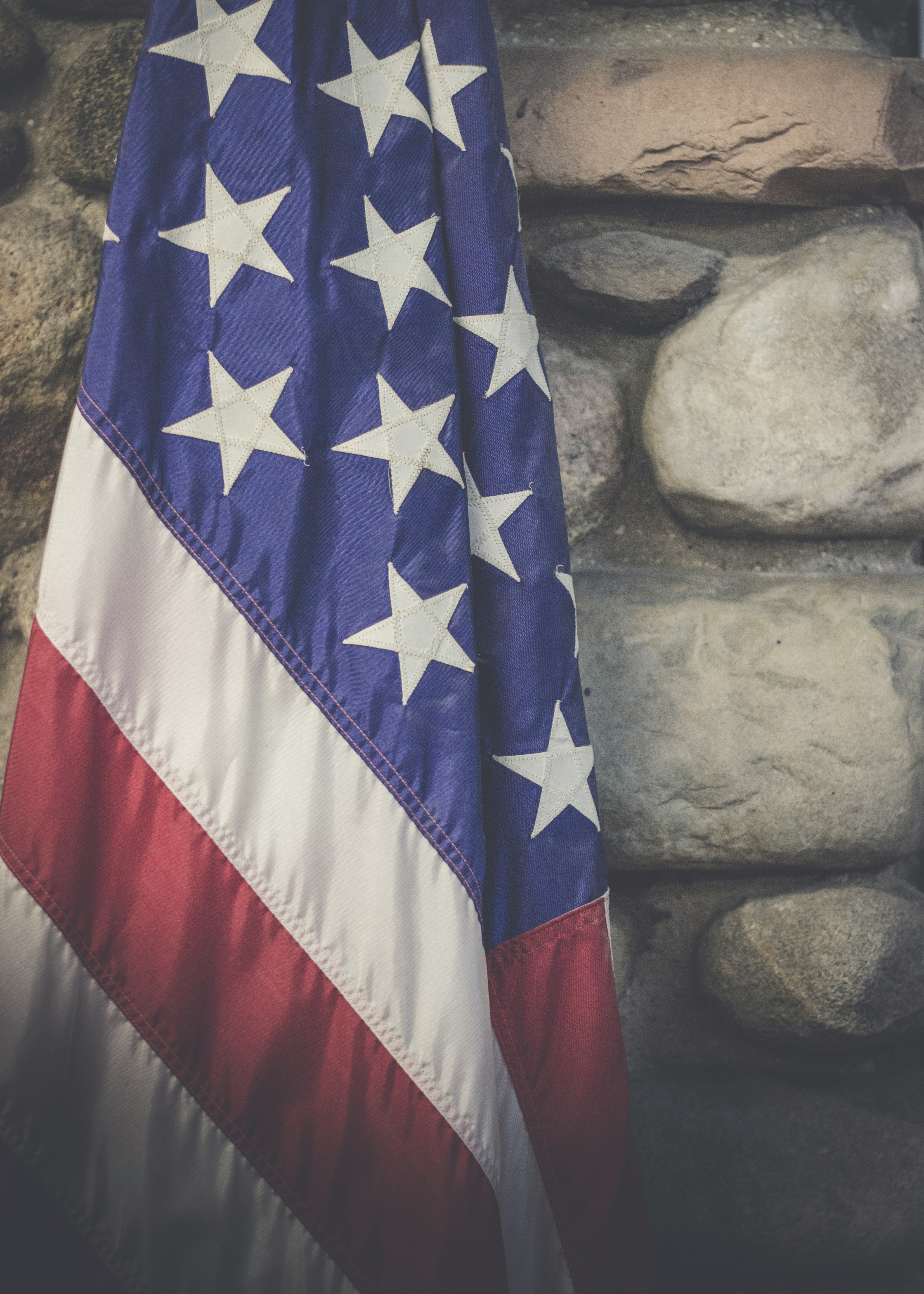Veteran sitting alone at his front door, head in hands